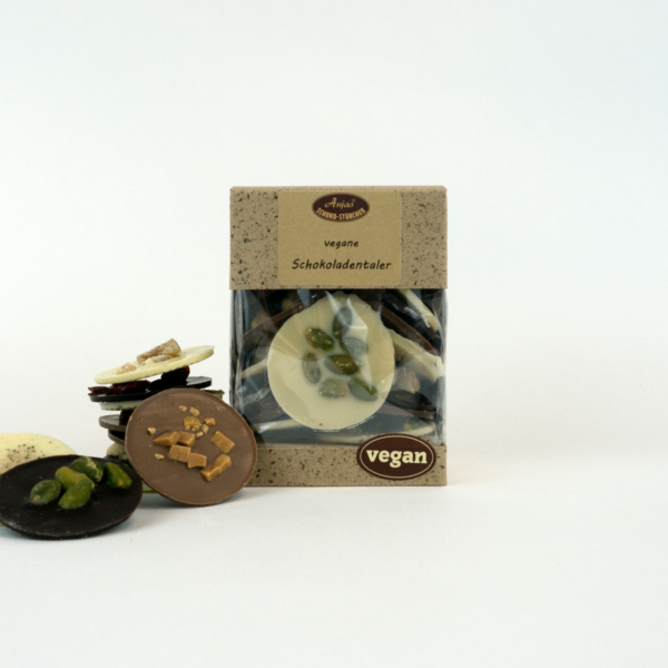 Schoko-Taler, vegan(arriba, choc blanc, Choc brun, Kokos, Pistazie, Cranberry, Haselnuss, Himbeercrisp)